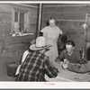 A hand of poker at the Forty-two party. Pie Town, New Mexico