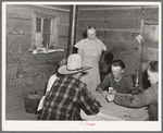 A hand of poker at the Forty-two party. Pie Town, New Mexico