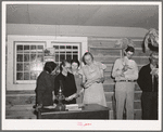 Farmers and wives singing at the literary society. Pie Town, New Mexico