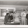 Farmers and wives singing at the literary society. Pie Town, New Mexico