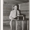 Mr. Leatherman, homesteader from Texas, leading the singing at church services. Pie Town, New Mexico