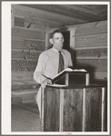 Mr. Leatherman, homesteader from Texas, leading the singing at church services. Pie Town, New Mexico