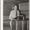 Mr. Leatherman, homesteader from Texas, leading the singing at church services. Pie Town, New Mexico