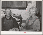 Mr. and Mrs. George Hutton, Sr., homesteaders from Oklahoma. Mr Hutton says, "There is nothing I'd rather see less than a cotton field." Pie Town, New Mexico