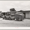 Car and trailer belonging to family coming through Pie Town, New Mexico, in search of work in the tie-cutting camp