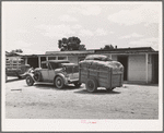 Car and trailer belonging to family coming through Pie Town, New Mexico, in search of work in the tie-cutting camp