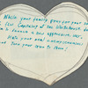 Paper heart-shaped messages in English