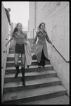 Colleen Neary and Karen O'Sullivan descending staircase of New York Stage Theatre stage entrance at Lincoln Center