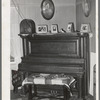 Corner of living room in farm home of tenant purchase client in Maricopa County, Arizona