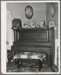 Corner of living room in farm home of tenant purchase client in Maricopa County, Arizona