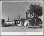 Dairy barn which contains milking stalls, cooling equipment, cream separator and cold storage locker. Casa Grande Valley Farms, Pinal County, Arizona