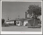 Dairy barn which contains milking stalls, cooling equipment, cream separator and cold storage locker. Casa Grande Valley Farms, Pinal County, Arizona
