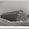 Baled hay for the stock. Casa Grande Valley Farms, Pinal County, Arizona