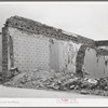 Ruins of old building on the main street of Tombstone, Arizona. While this is not a ghost town (there is still mining activity in this region), the town is not the same as it was in its lusty youth