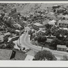 Looking down on the highway leading into Bisbee, Arizona. This highway becomes the main street in town and the houses are built up the sides of the mountain