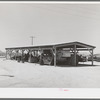 Shelter for farm machinery at the Casa Grande Valley Farms. Pinal County, Arizona