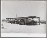 Shelter for farm machinery at the Casa Grande Valley Farms. Pinal County, Arizona