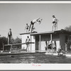 Youngsters in the swimming pool at the dude desert ranch at Coolidge, Arizona