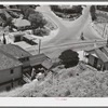 Looking down on the miners' monument at Bisbee, Arizona. Inhabitants brag that this is the largest town which has no house-to-house mail delivery, the post office department considering the streets too precipitous to make delivery