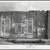 Cracking adobe walls in abandoned building in Tombstone, Arizona