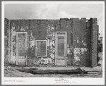 Cracking adobe walls in abandoned building in Tombstone, Arizona