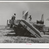 Hay machine at the Casa Grande Valley Farms. Pinal County, Arizona