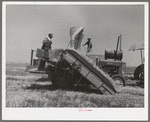 Hay machine at the Casa Grande Valley Farms. Pinal County, Arizona