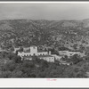 Tyrone, New Mexico, a town developed by the Burro Mountain Copper Company, now inactive, but which is developing the town as a summer resort