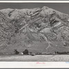 The Mormon farms are invariably situated in the foot of the mountains to take advantage of the mountain streams. Box Elder County, Utah