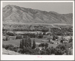 Farms on the outskirts of Logan, Utah, Cache County. At the foot of the mountain one of the levels of ancient Lake Bonneville can be seen