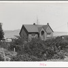Home of Mormon farmer, one of the Ericson brothers, who are FSA clients. Box Elder County, Utah