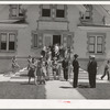 Congregation leaving the Latter Days Saints Church at Mendon, Utah