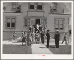 Congregation leaving the Latter Days Saints Church at Mendon, Utah