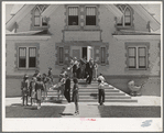 Congregation leaving the Latter Days Saints Church at Mendon, Utah
