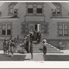 Congregation leaving the Latter Days Saints Church at Mendon, Utah