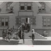 Congregation leaving the Latter Days Saints Church at Mendon, Utah