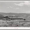 Hay and cow barn of Spanish-American farmer. Chamisal, New Mexico