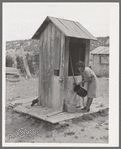 Covered well on Spanish-American family. Chamisal, New Mexico