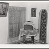 Corner of room in home of Spanish-American farmer. Chamisal, New Mexico