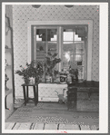 Detail of bedroom in Spanish-American farmer with homemade tools. Chamisal, New Mexico