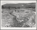 Creek with diversional channel to irrigation ditch on the left, Chamisal. New Mexico