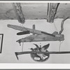 Old handmade plow and hoe in liquor store. Costilla, New Mexico