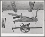Old handmade plow and hoe in liquor store. Costilla, New Mexico