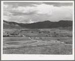 The valley of the Rio Costilla at Amalia, New Mexico. The irrigated farmland is in the center with the grazing land surrounding