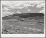 Tributary of the Rio Costilla near Amalia, New Mexico. Irrigated farmland is in the center and grazing land surrounding