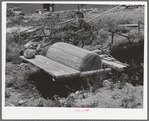 Old wooden roller. Amalia, New Mexico