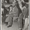 Spanish-American farmers watching show. Penasco, New Mexico