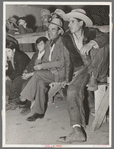 Spanish-American farmers watching show. Penasco, New Mexico