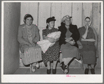 Spanish-American women waiting to see doctor at the traveling clinic at Chamisal, New Mexico
