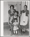 Spanish-American farmer and his family. Chamisal, New Mexico